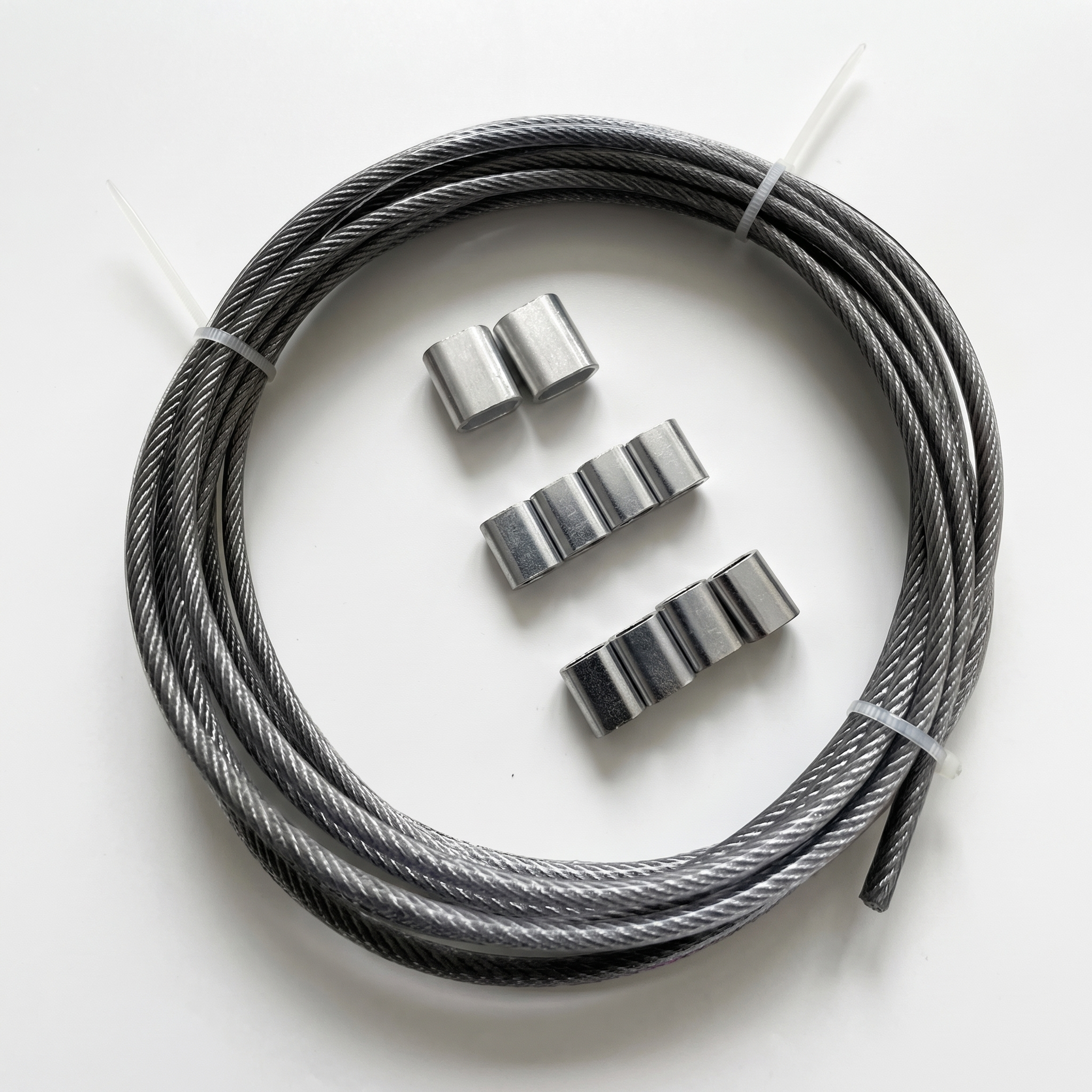 TheFrenchNets stainless steel line kit coiled with sleeve crimps before install.