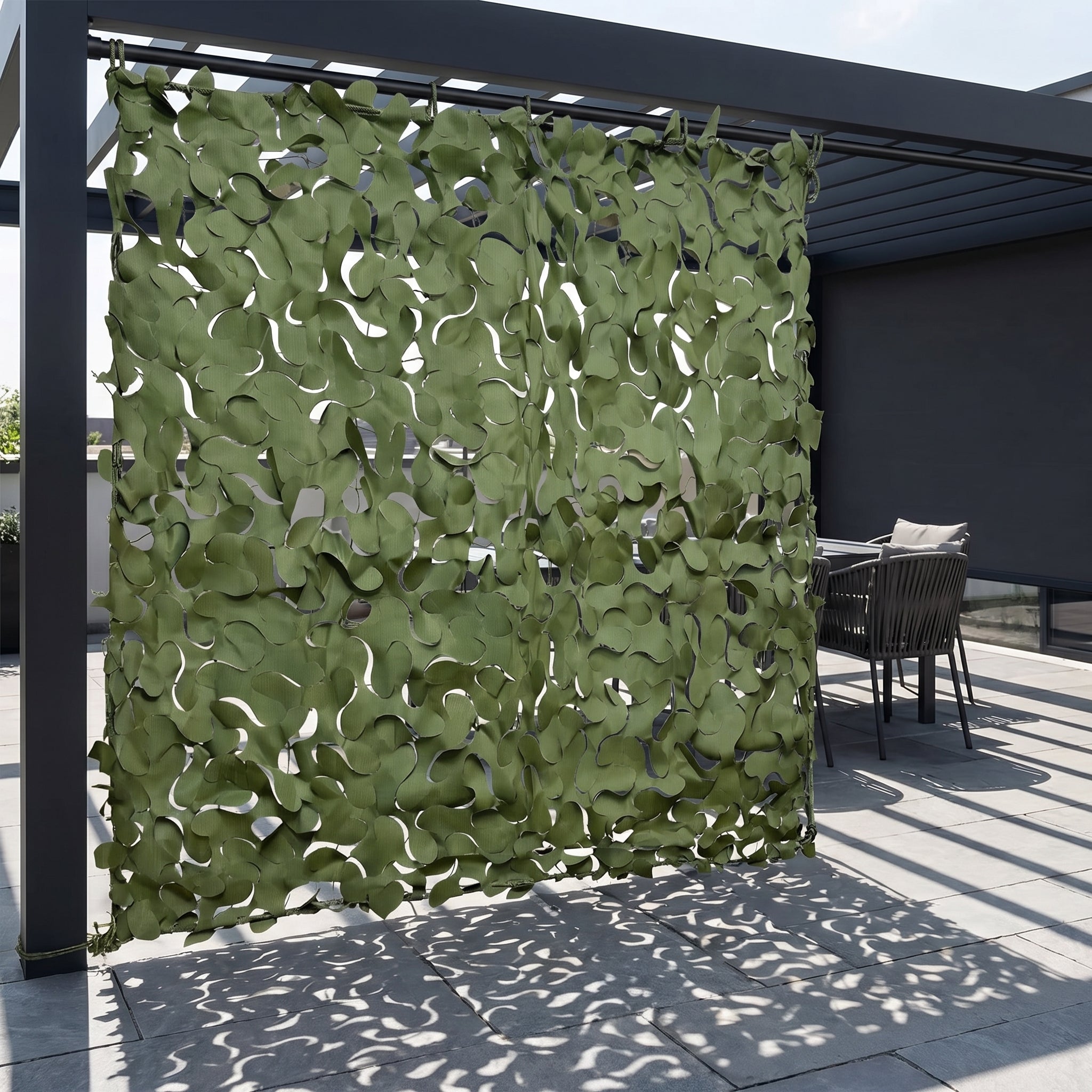 TheFrenchNets mesh curtain panel in white hung along a pergola crossbeam.