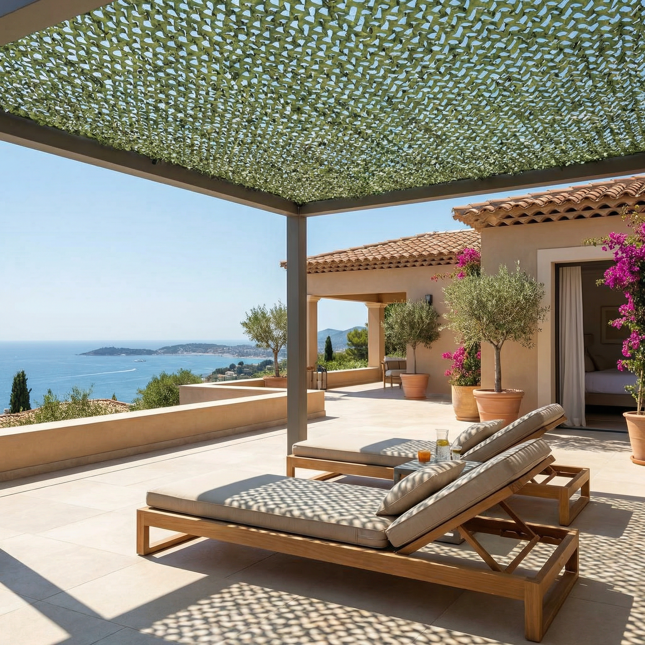 TheFrenchNets olive reinforced shade net spread over a planted garden patio.